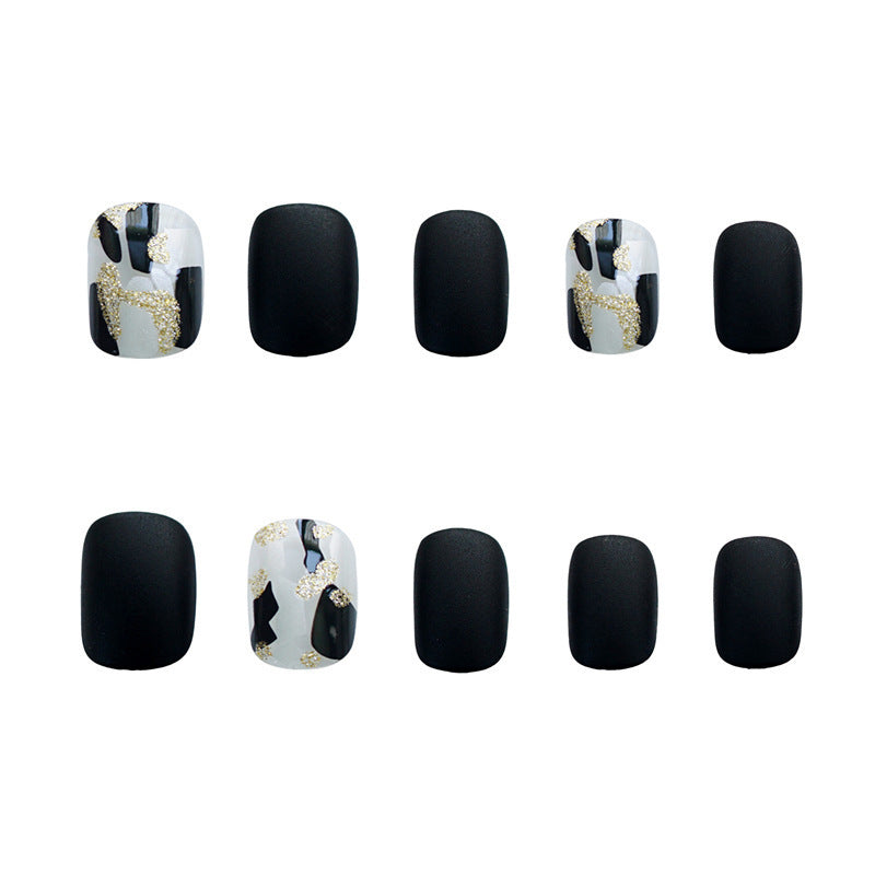 Wearing Black Frosted Shell Fake Nails – Elegant Matte Press-On Nails